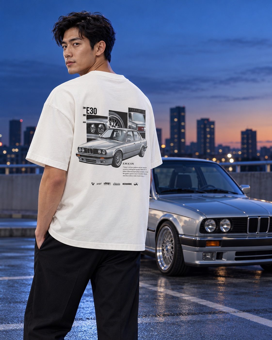 Male model wearing the white E30 tee beside a silver classic sports sedan — AI styling preview